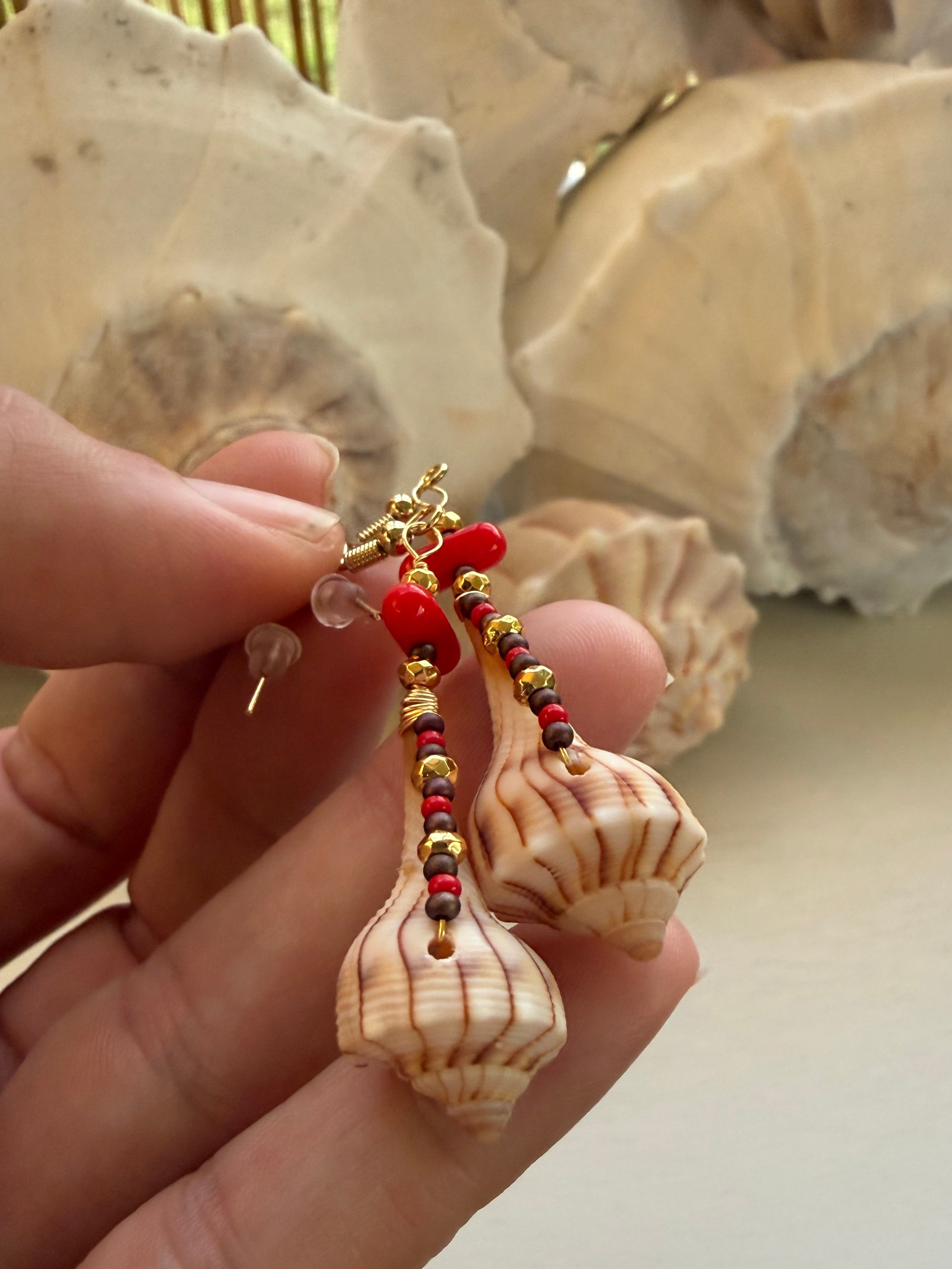 Lightning Whelk dangle earrings and drop pendant.