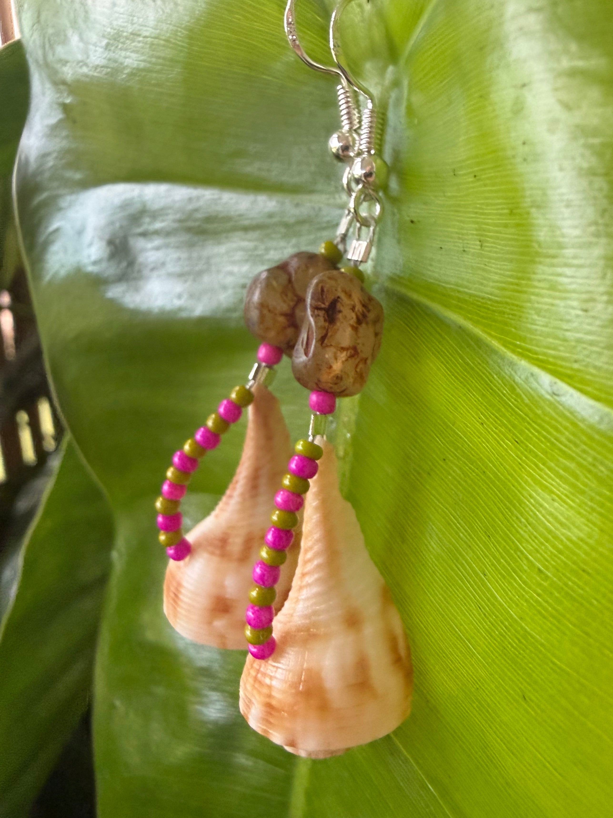 Pear whelk earrings with stone flower bead.