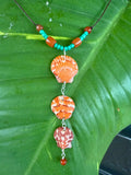 Orange Scallop necklace.