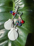 Wire wrapped scallop with red white and blue beads with stars