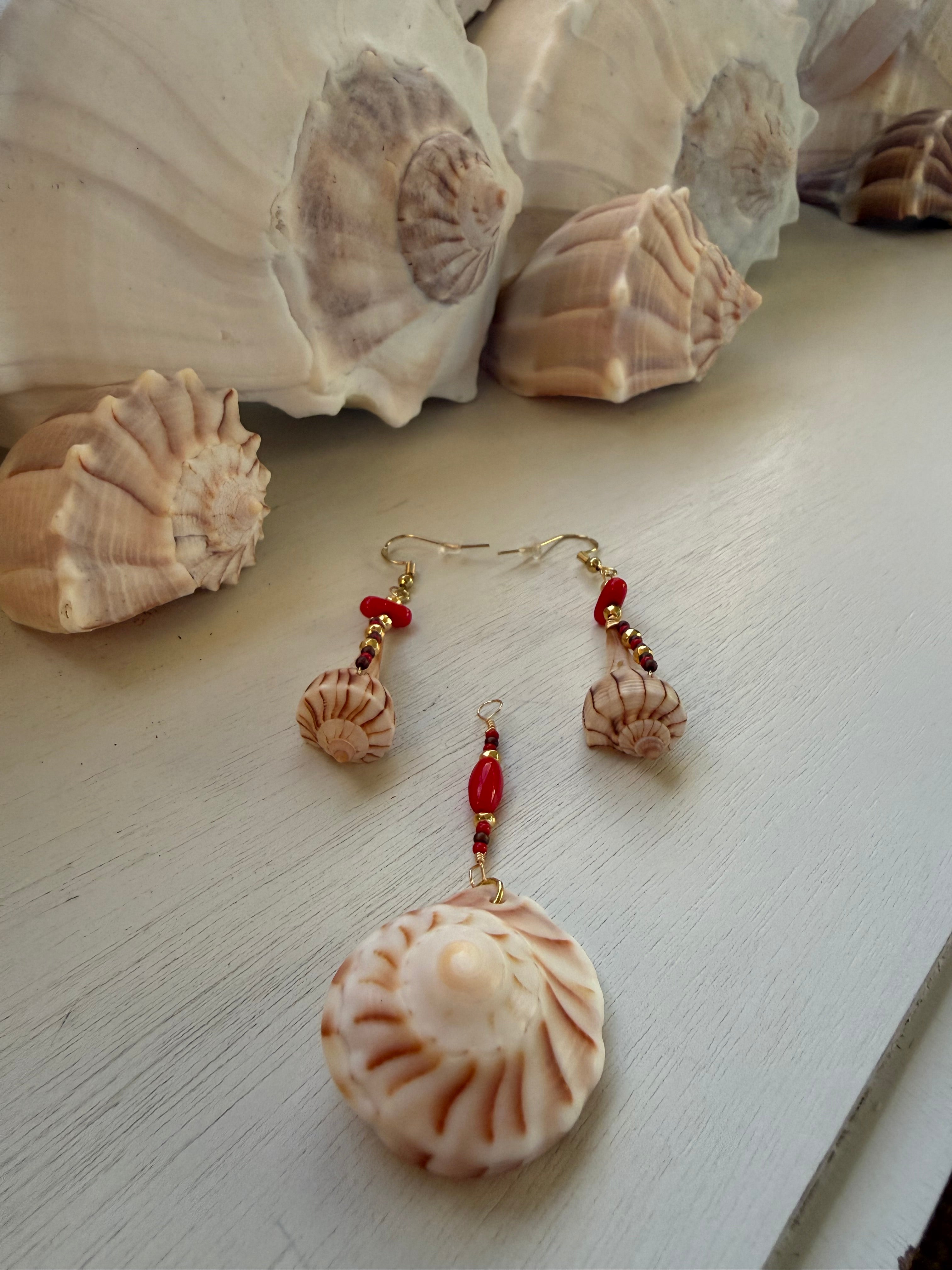 Lightning Whelk dangle earrings and drop pendant.