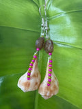 Pear whelk earrings with stone flower bead.