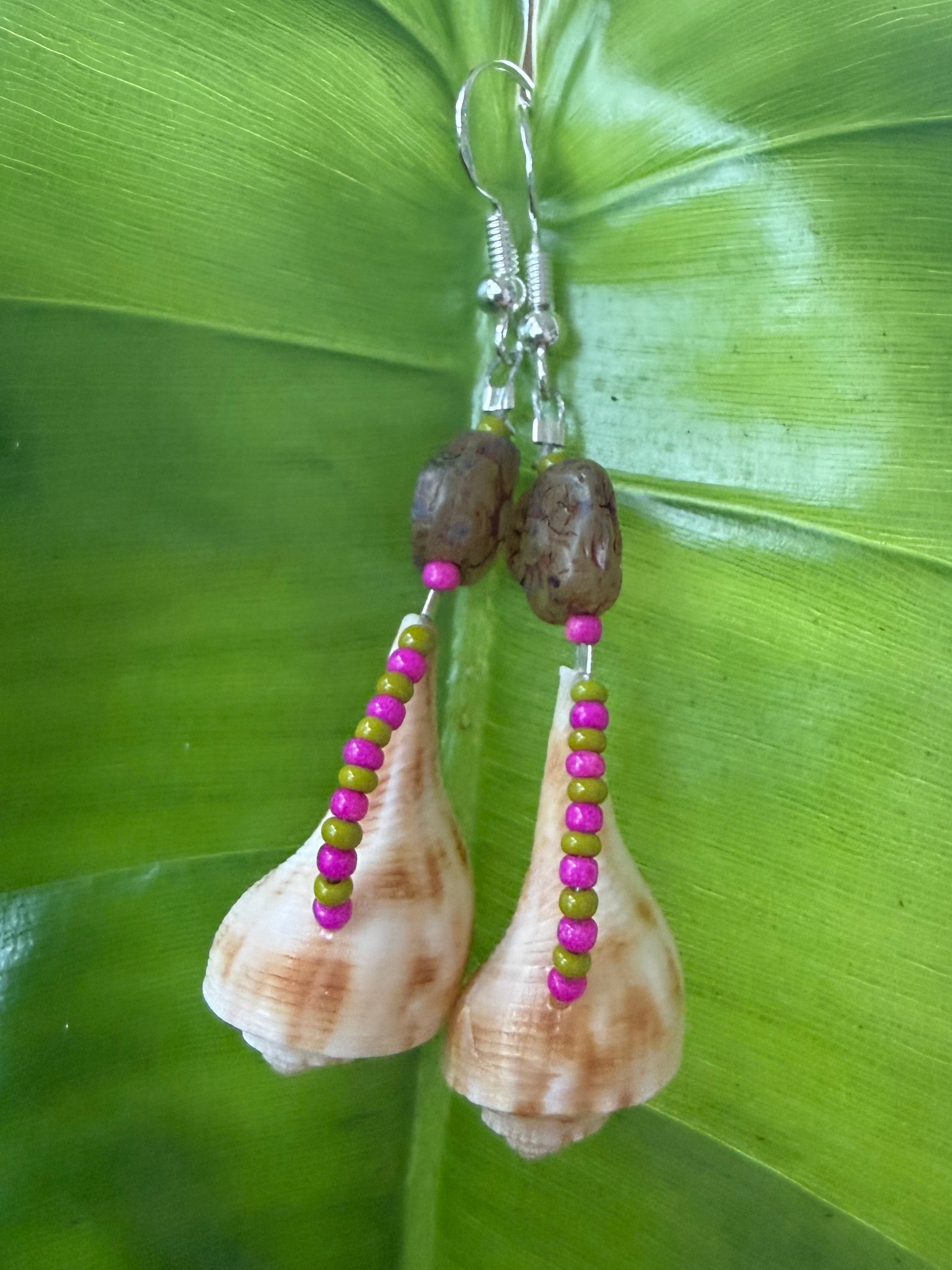 Pear whelk earrings with stone flower bead.